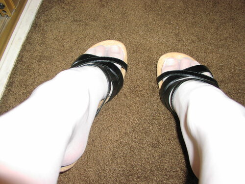 White hosed feet in heels