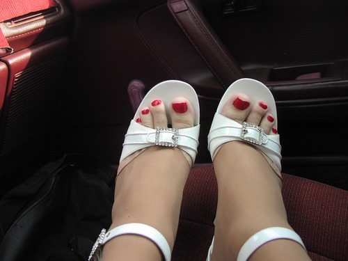 White heels in car