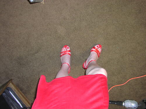 Standing in red heels