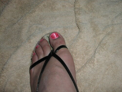 Black strap sandals on my feet