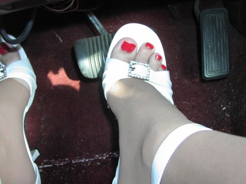 Red polish in white heels