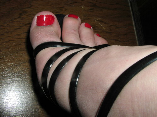 Sexy red toenails with my black heels